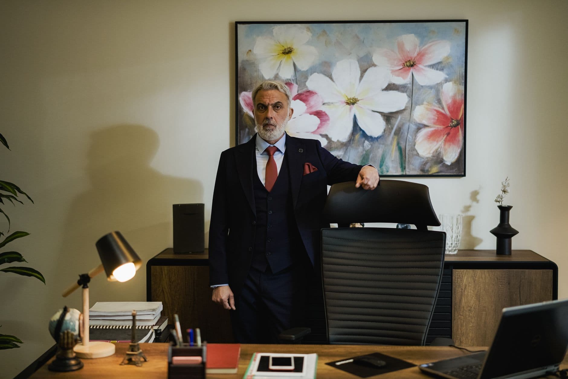 A business owner standing in his office