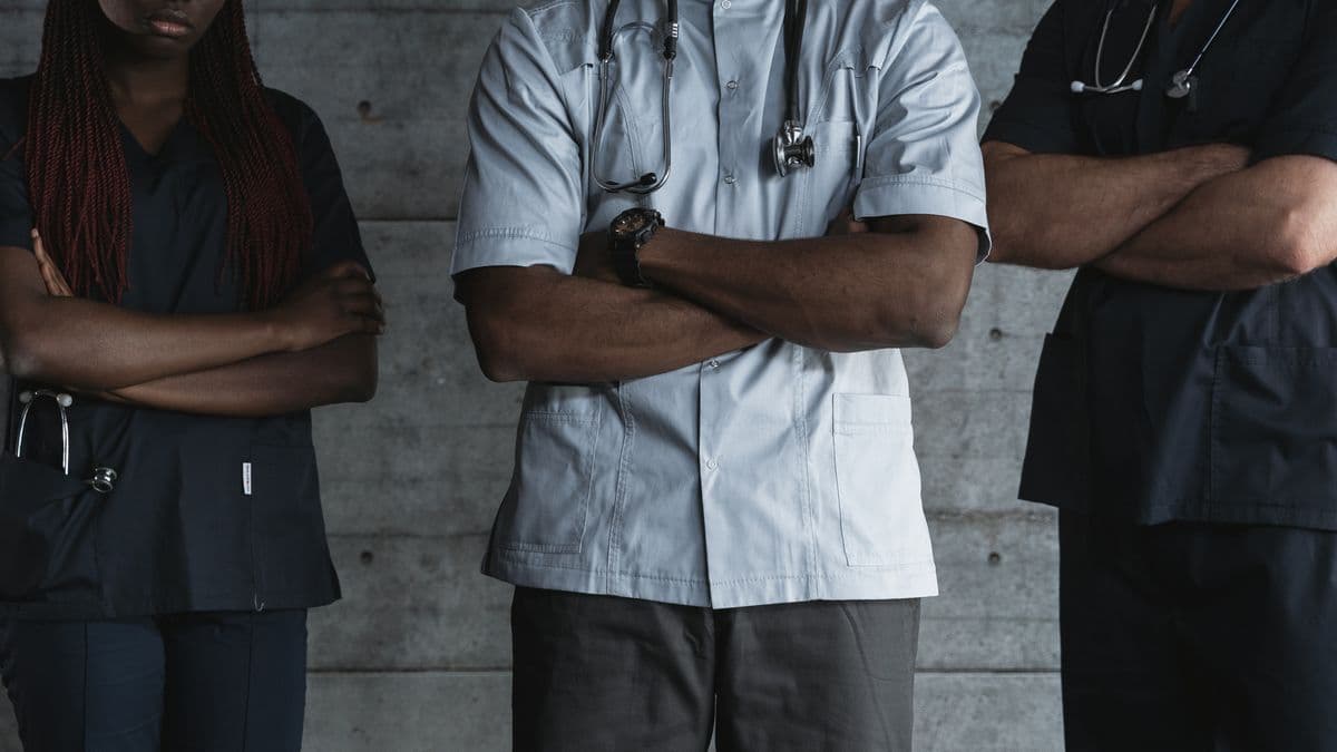 A team of medical professionals with stethoscopes